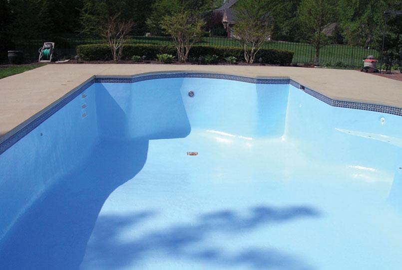 Empty pool with a blue bottom